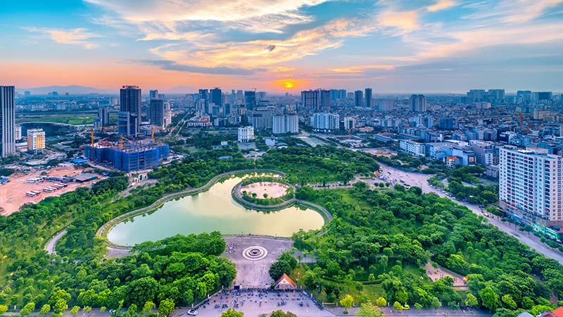 Hanoi skyline cityscape at twilight period. Cau Giay park, west of Hanoi